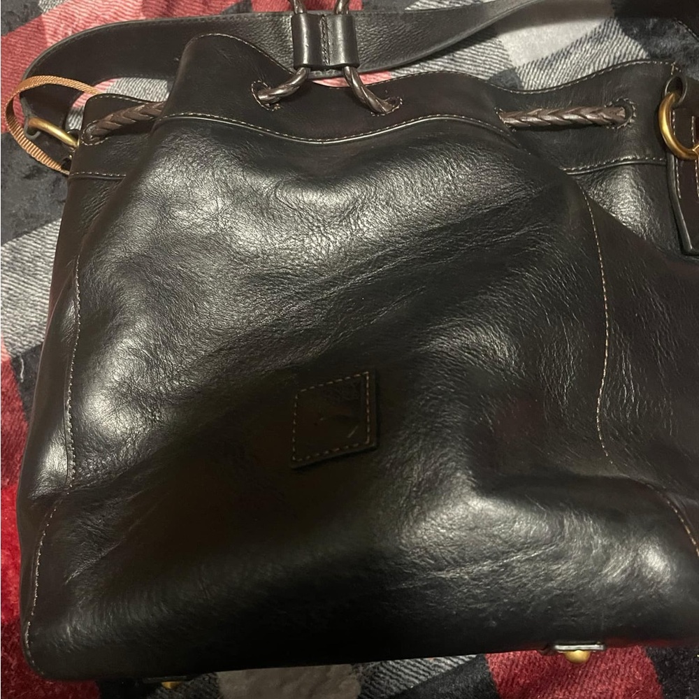Dooney Florintine leather drawstring handbag.